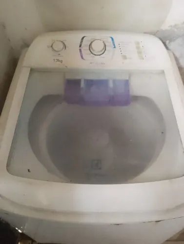 Máquina de lavar com defeito