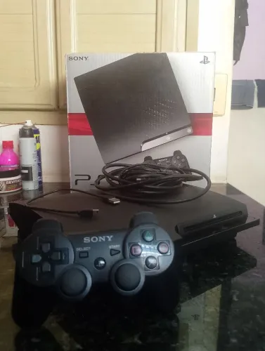 Ps3 slim na caixa com 1 jogo