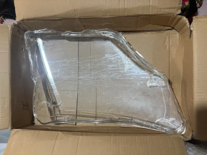 Lente Farol Pajero Full 2008-2021 lado esquerdo (motorista)