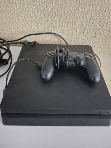 Ps4 1tb + controle novo + alguns jogos