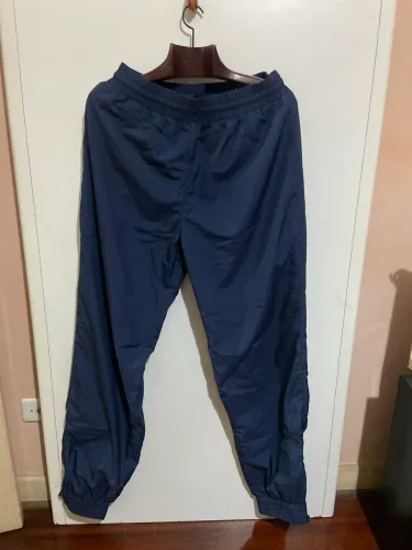 Calça Esportiva da Federação Internacional de Tênis 100% Poliamida - Tamanho M.