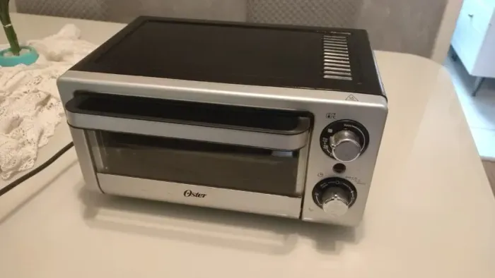 Forno de bancada elétrico Oster Compact 10L prata