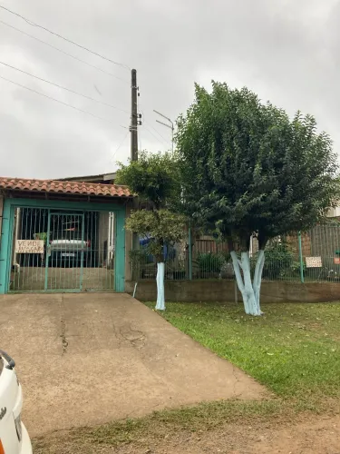 Vendo terreno com duas casas na parada 107 de Gravataí