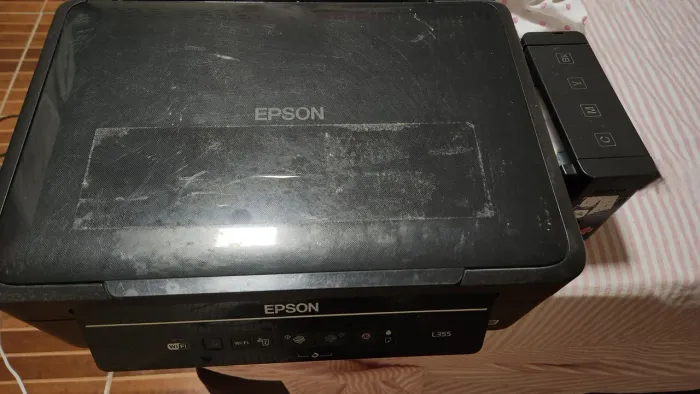 Impressora Epson L355 para conserto ou retirada de peças,defeito no cabeçote de impressão.