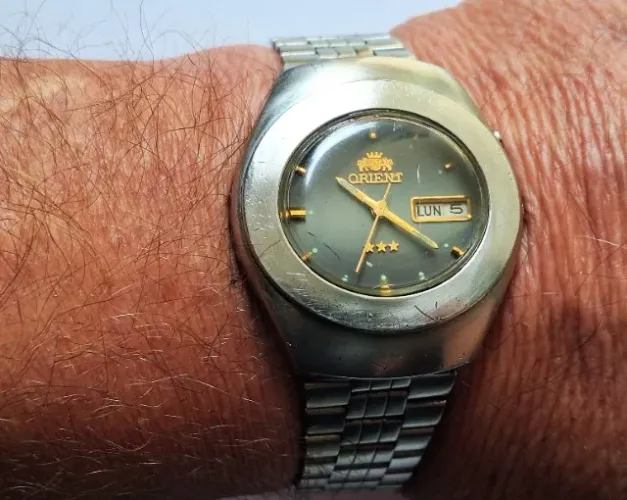 A06= ANTIGO RELOGIO ORIENT FUNCIONANDO VER DETALHES EM DESCRIÇAO