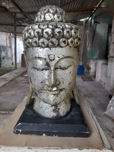 Cabeça de Buda em Madeira ( leia )