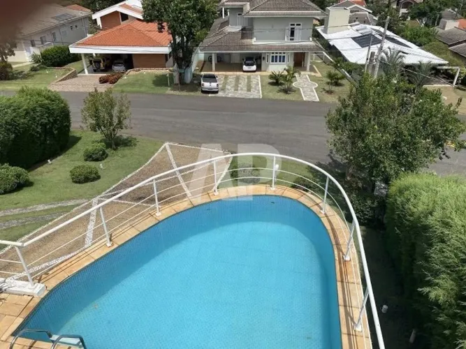 Casa com 4 dormitórios à venda, 415 m² por R$ 1.800.000,00 - Condomínio Campos de Santo An