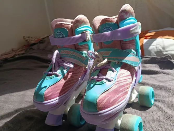 Patins infantil ajustável , tamanho 30 ao 33.