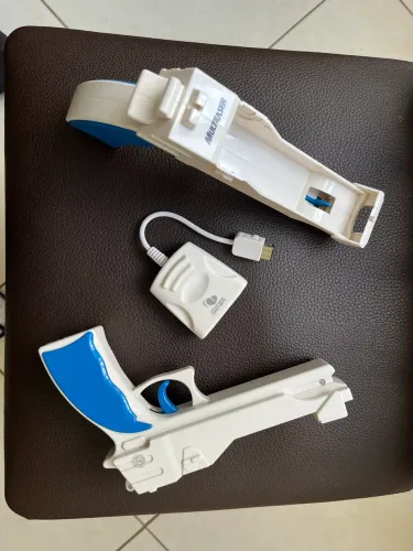 2 pistolas nintendo wii + adaptador ps