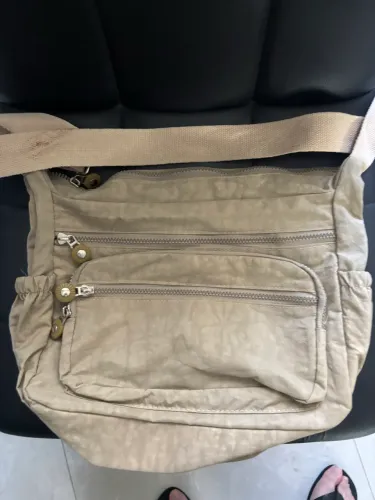 bolsa bege media inspiração kipling