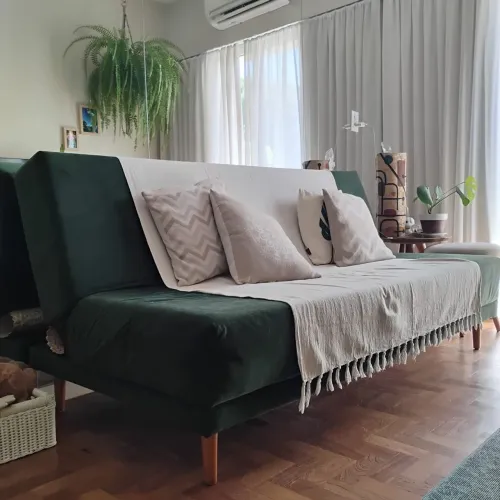 Sofá-cama verde suede
