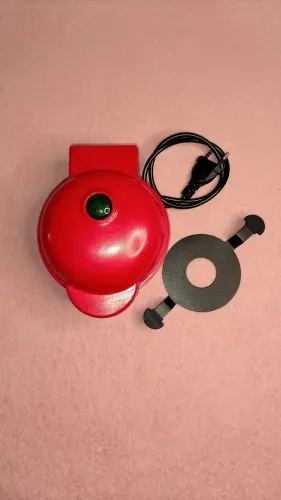 Maquina de fazer mini bolos.