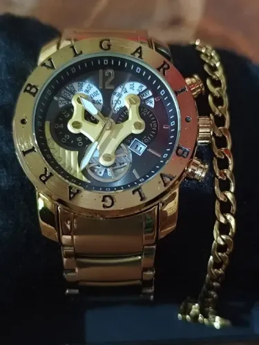 RELÓGIO BVLGARI DOURADO COM CALENDÁRIO + PULSEIRA DOURADA EM AÇO GRÁTIS.<br>