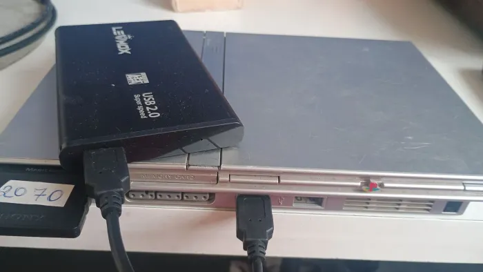 Playstation 2 modelo prata com HD de 320 GB