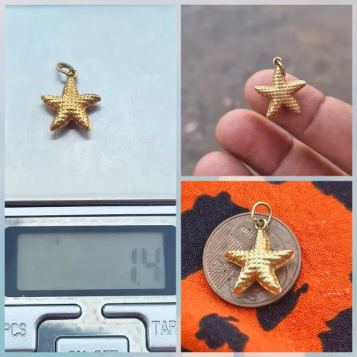 Pingente de ouro 18K estrela 1.4 disponível 700,00