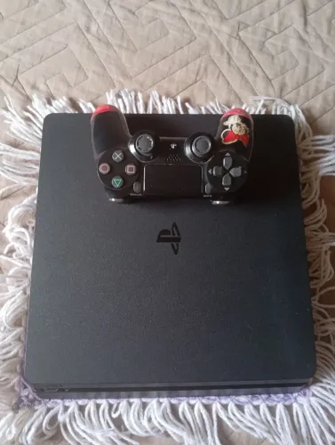 PS4 slim 500 GB 01 controle e 44 jogos em mídia digital