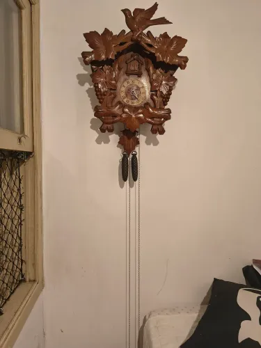 Relógio antigo cuco Rei