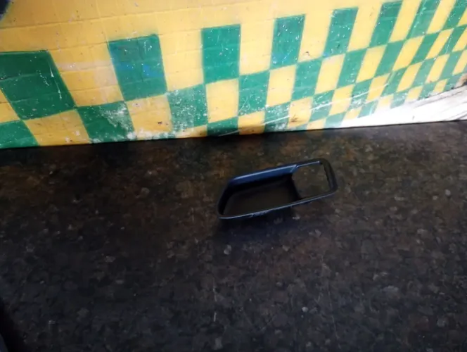 Moldura maçaneta interna porta traseira lado esquerdo Corolla 2020 a 2026 69298x1g03