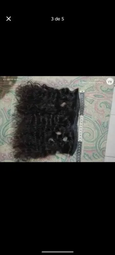 Aplique de cabelo  humano cacheado.