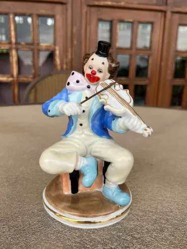 estatueta palhaço músico porcelana monti piero