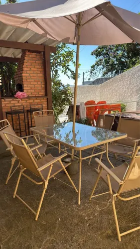Mesa de jardim com 6 cadeiras + guarda sol 