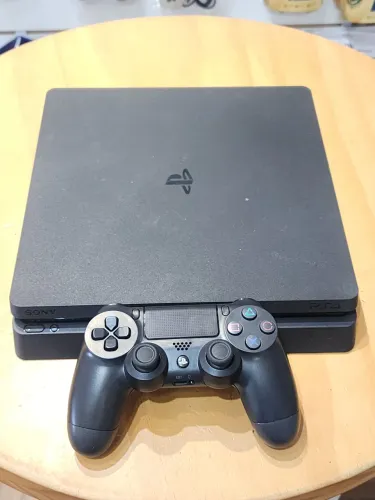 Ps4 slim de 500gb com 1 controle paralelo por 1,200 no pix