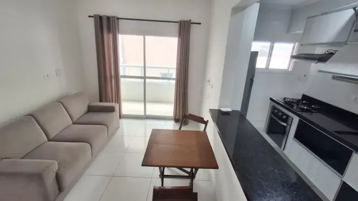 Apartamento de 2 dormitórios sendo 1 suíte com 2 vagas e lazer na cobertura Praia Grande -