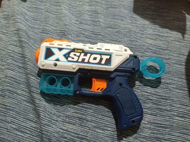 Arma xshot incluso 5 balas aleatórias 