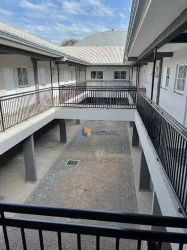 Prédio com 15 Kitnets, 2 salas comerciais e 16 garagens