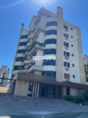Apartamento no Centro, 126 m², 2 dormitórios, semimobiliado com terraço e 1 vaga coberta.