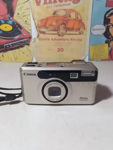 era analógica compacta Canon Prima Zoom 60 sem teste (não tenho bateria)
