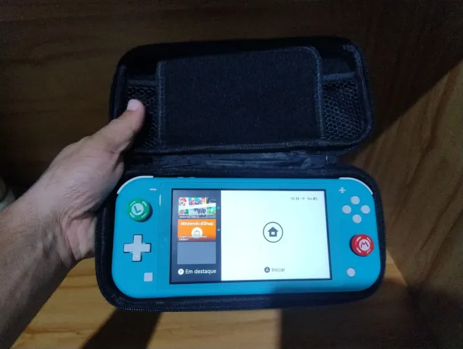 Vendo Nintendo Switch lite turquesa semi novo