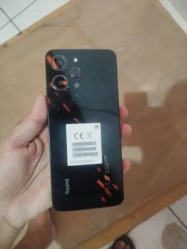 Redmi 12 256GB, tela queimada, está tando sinal, vibra quanto liga