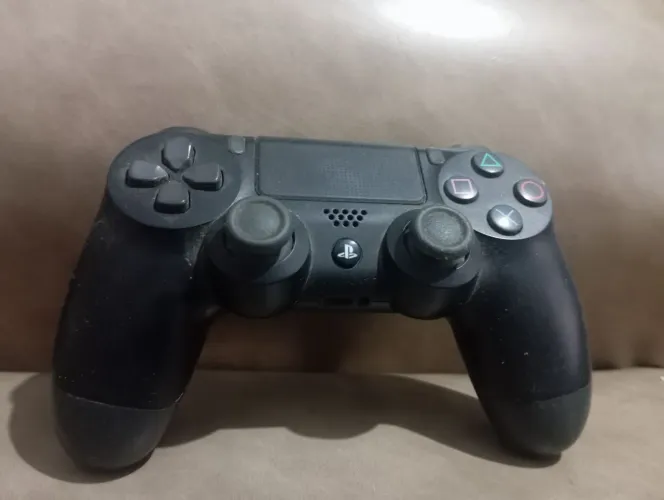 Controle do ps4 com defeito de carregar
