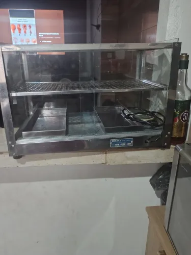 Vendo vitrine de salgado funcionando normalmente.