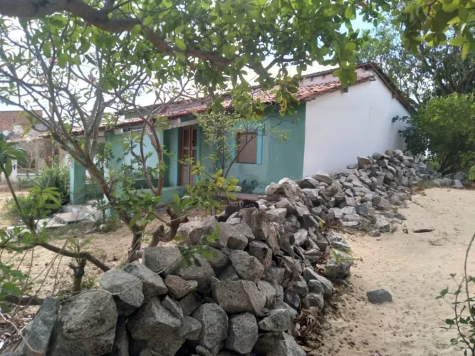 Vendo terreno com casa 