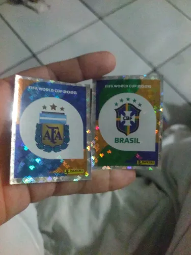 Figurinhas brilhantes Copa 2026 (Logos Brasil e Argentina)