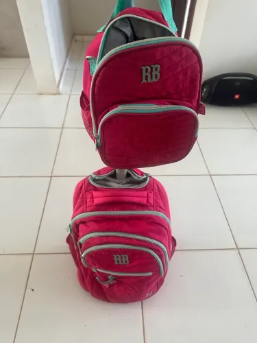 Bolsa de rodinha e lancheira Rebeca bombom original