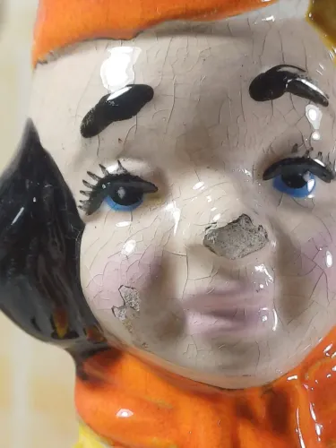 Escultura em faiança palhacinho anos 60 vitrificado 