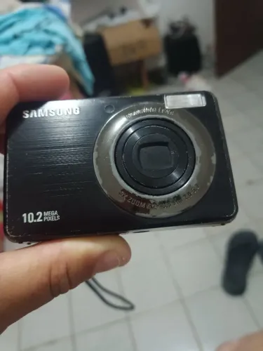 Samsung 10.2 megapixels 3x zoom ela liga mas a tela não abre