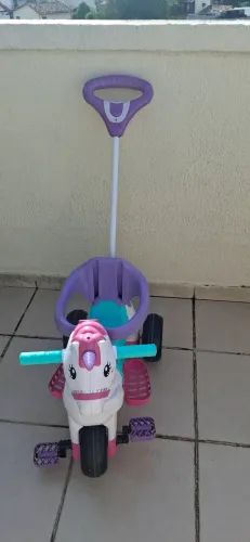 Triciclo unicornio calesita