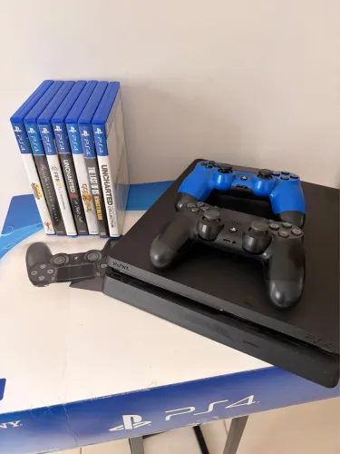 Ps4 Slim 1tb com 2 manetes e 7 jogos