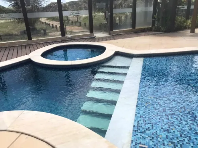 Chalé com 4 quartos, 3 suítes em Condomínio beira mar em Genipabu