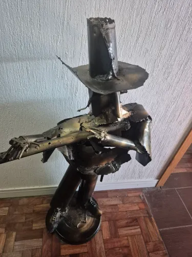 Escultura de Metal - flautista articulada com movimemto