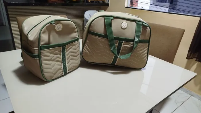 Vendo conjunto de bolsa de bebê, ninho e almofada de amamentação ?