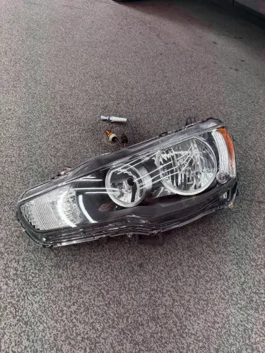 Farol Mitsubishi Lancer