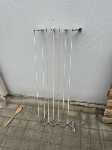 Varal retrátil de parede