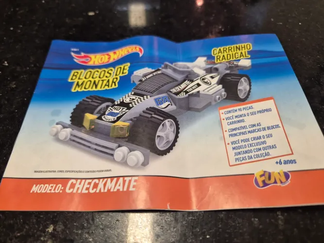 Hot Wheels Carrinho Radical - Modelo CHECKMATE +6anos