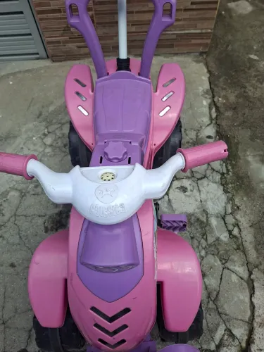 Motoca infantil calesita