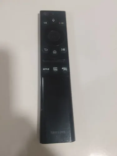 Controle remoto de TV Samsung original em perfeita condição para uso.